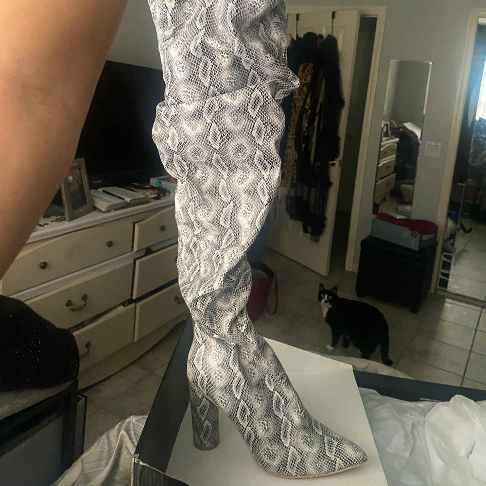 Snake skin over the knees boots
